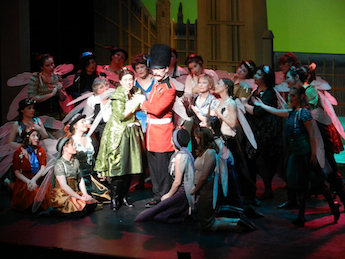 Iolanthe, 2012, Durham Savoyards Ltd.
Private Willis (Jay Dunbar), Queen (Lee Galbreath), and her Fairies Private Willis and Fairies